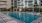a pool in front of a building