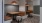 a room with tables and booths