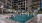 a swimming pool by a building
