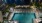 a pool surrounded by a building